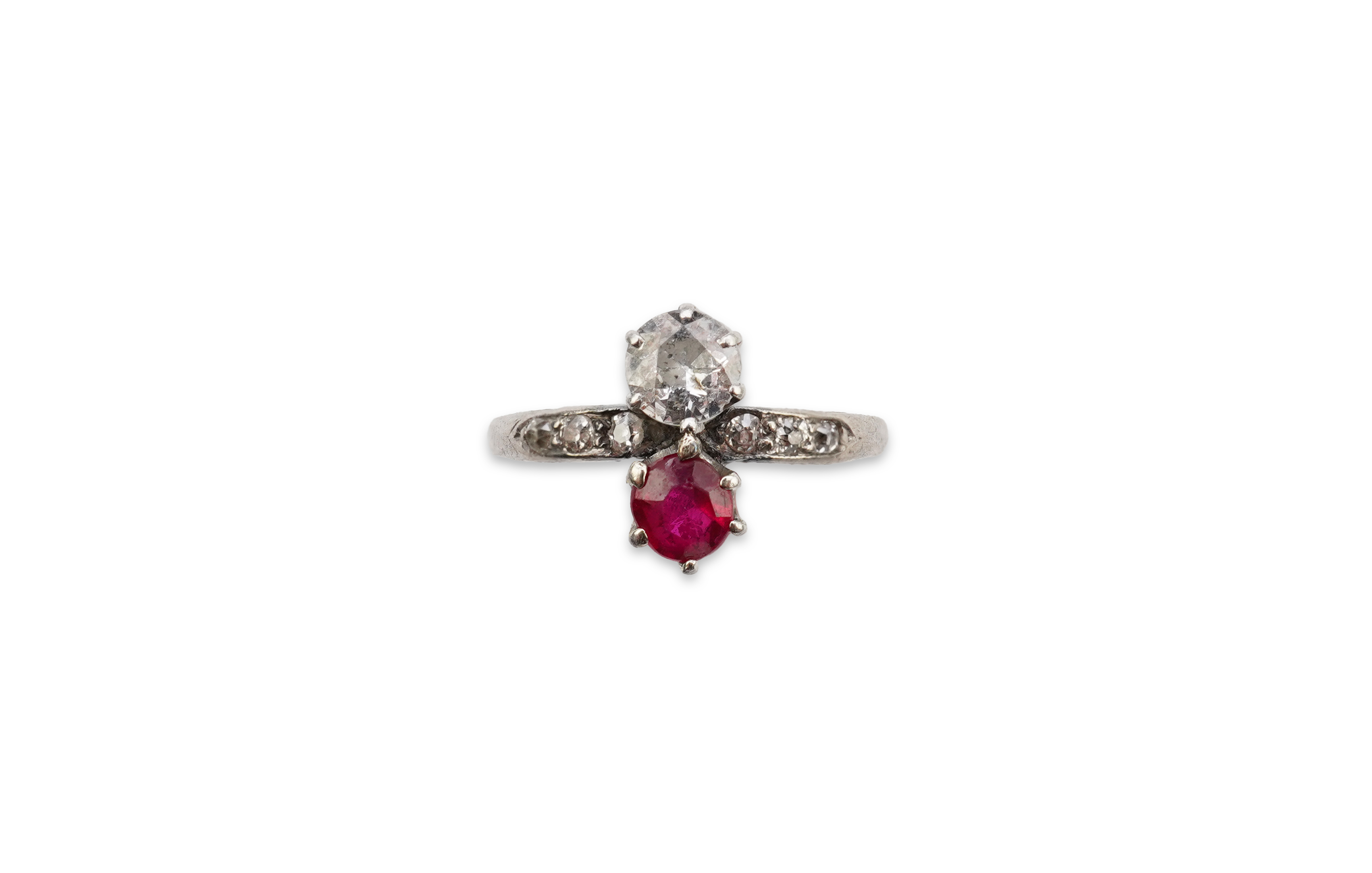 A synthetic ruby and diamond 'toi-et-moi' ring, early 20th century